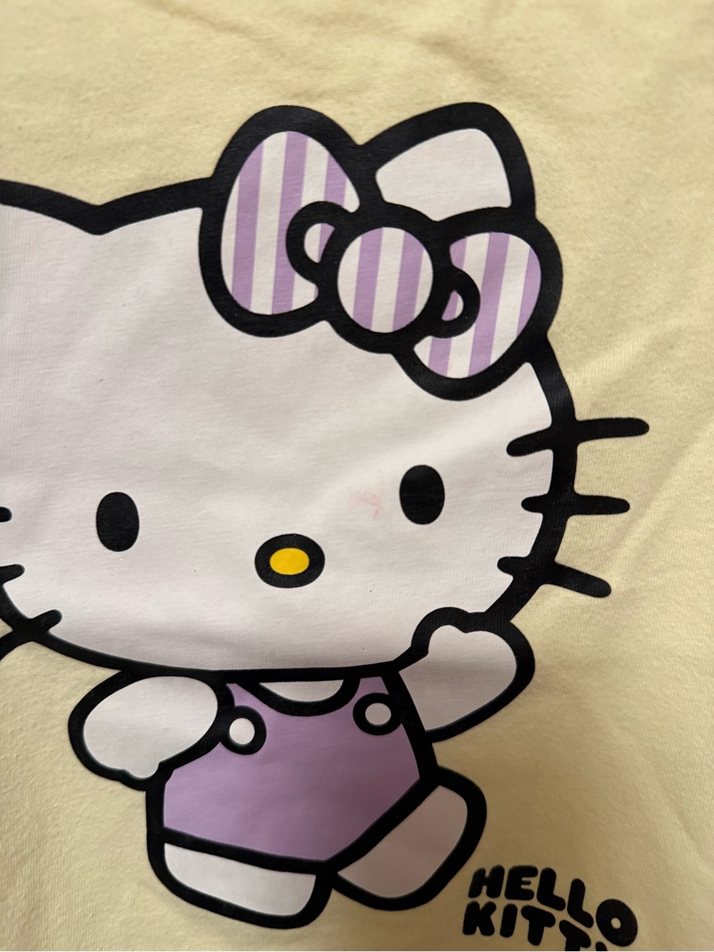 Hello Kitty Pale Yellow Tee with Purple Graphic - Kids Short Sleeve - Picture 2 of 3